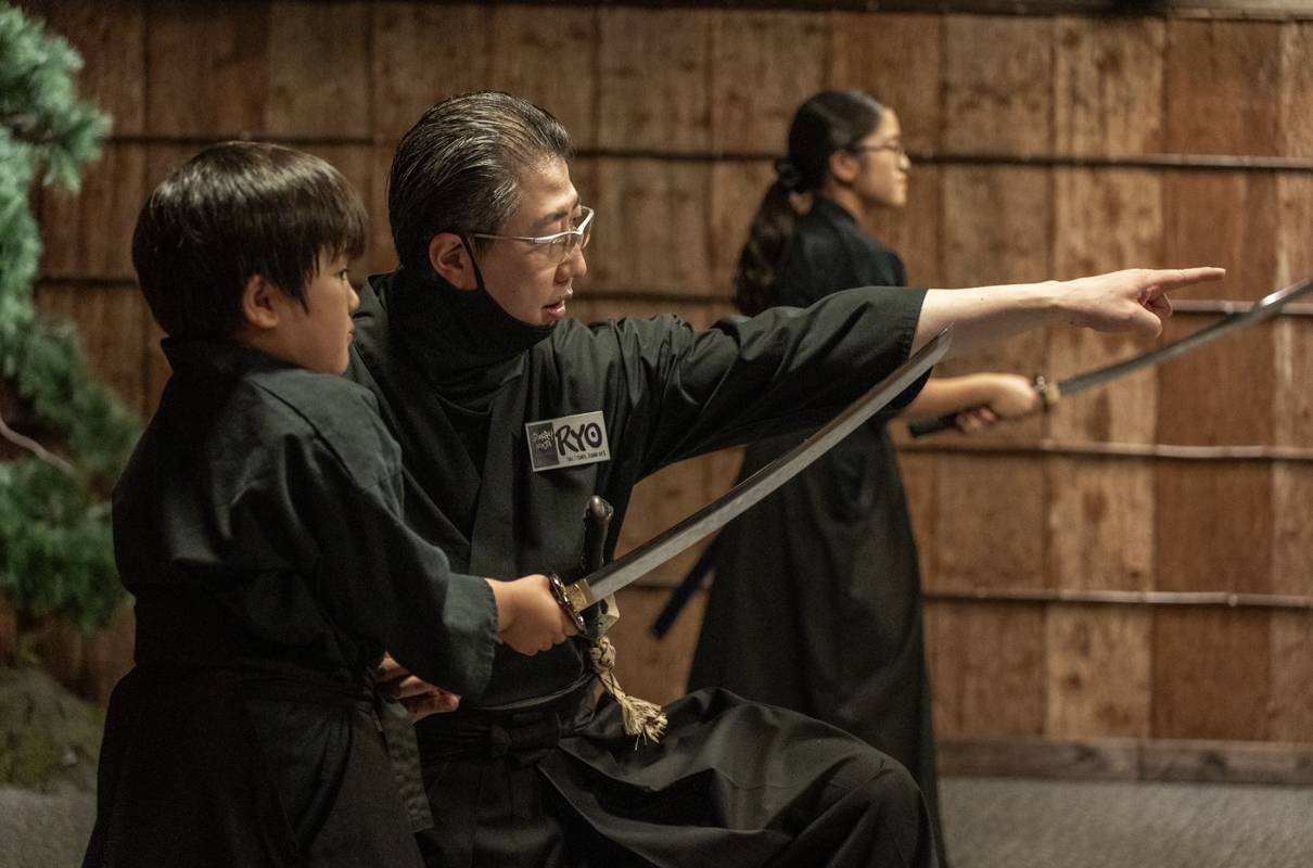 Samurai Master demonstrating correct striking form on the samurai target dummy