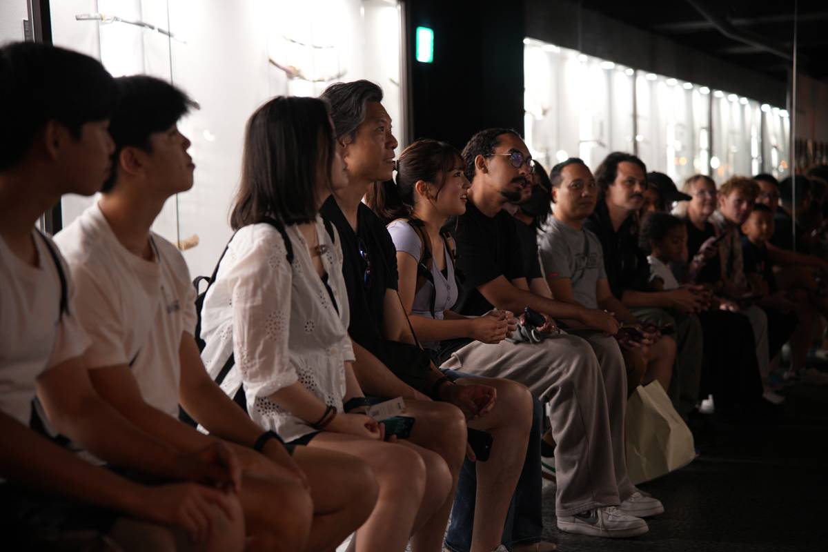 Guests watching a scene unfold together