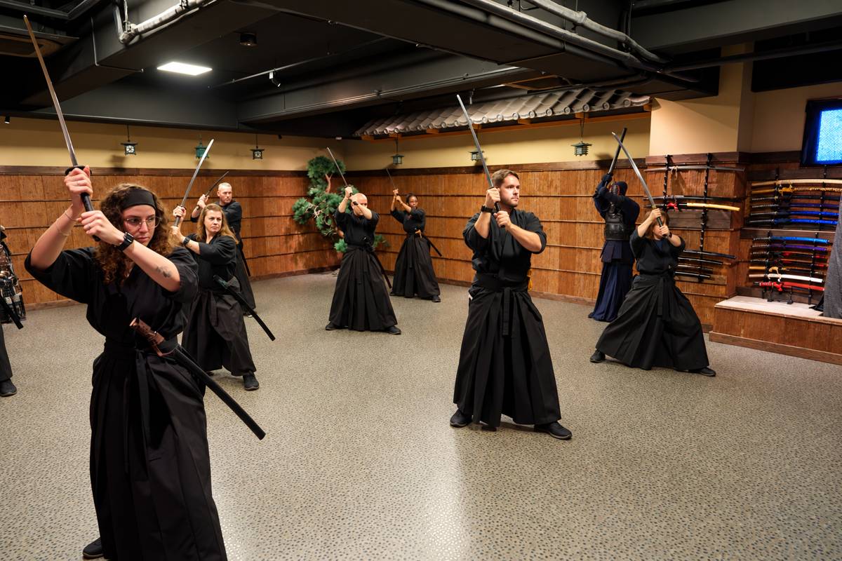 Practising a sequence of samurai sword movements