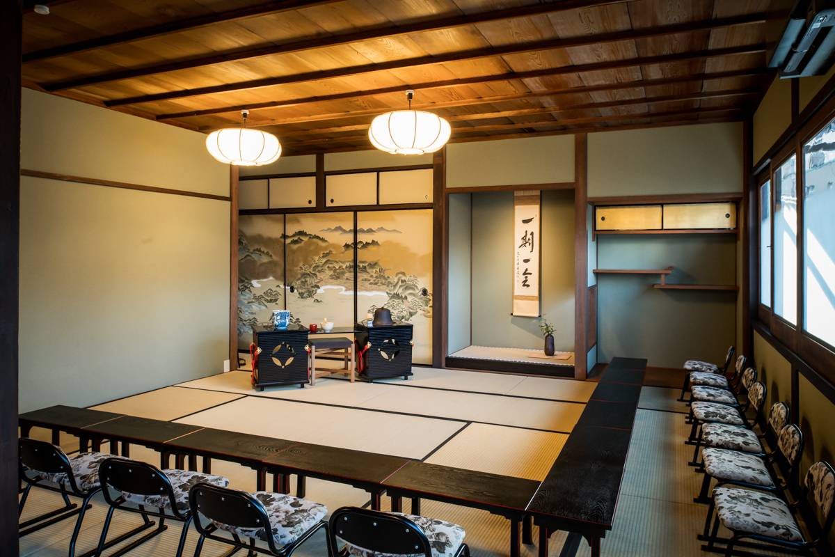 Tea master preparing matcha during Kyoto tea ceremony