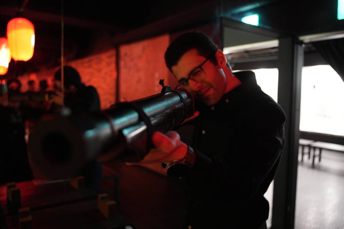 A guest trying a hands-on moment during the experience
